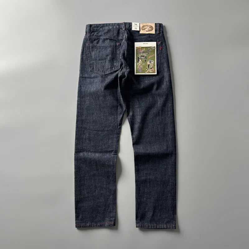 Men's straight leg cotton denim trousers in primary colour with mid-rise waist and retro American style.