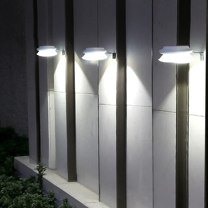 Solar-powered garden fence wall lamp with 9 LED lights in black or white shell options