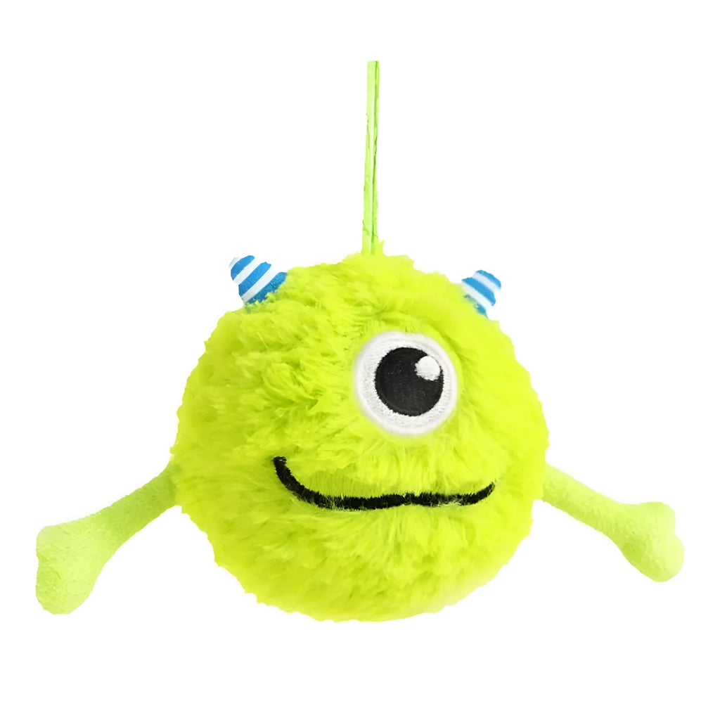 Green sound-activated dog teething toy ball with soft plush exterior for puppy gum massage