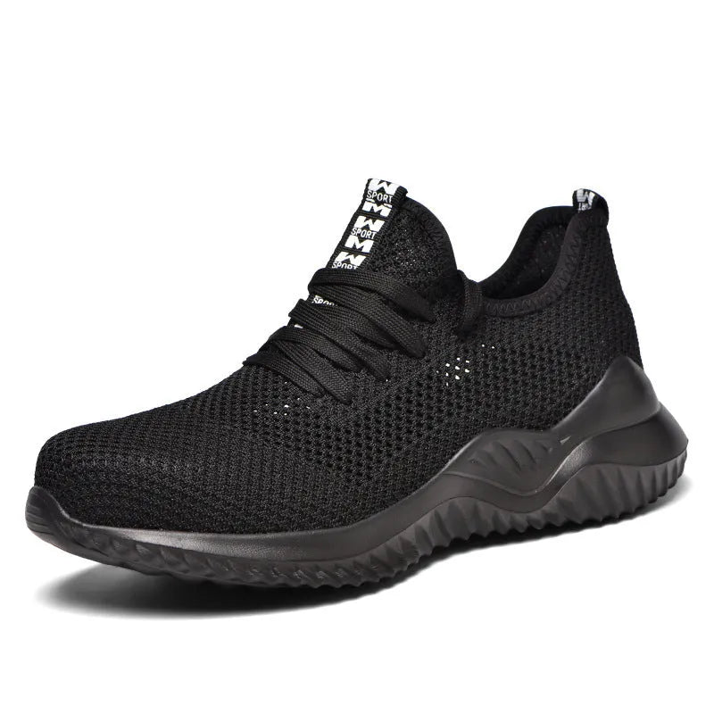 Black work safety shoe with steel toe cap and EVA sole on a grey background