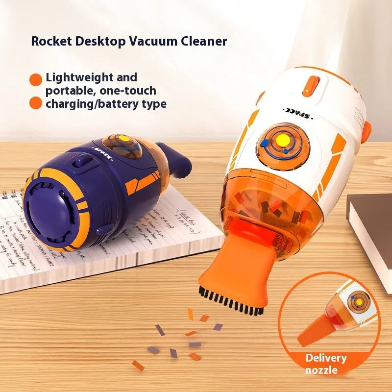 Handheld USB desktop vacuum cleaner in blue colour on a desk next to a keyboard