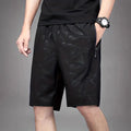 Men's loose fit polyester sports shorts in black, blue or grey colours