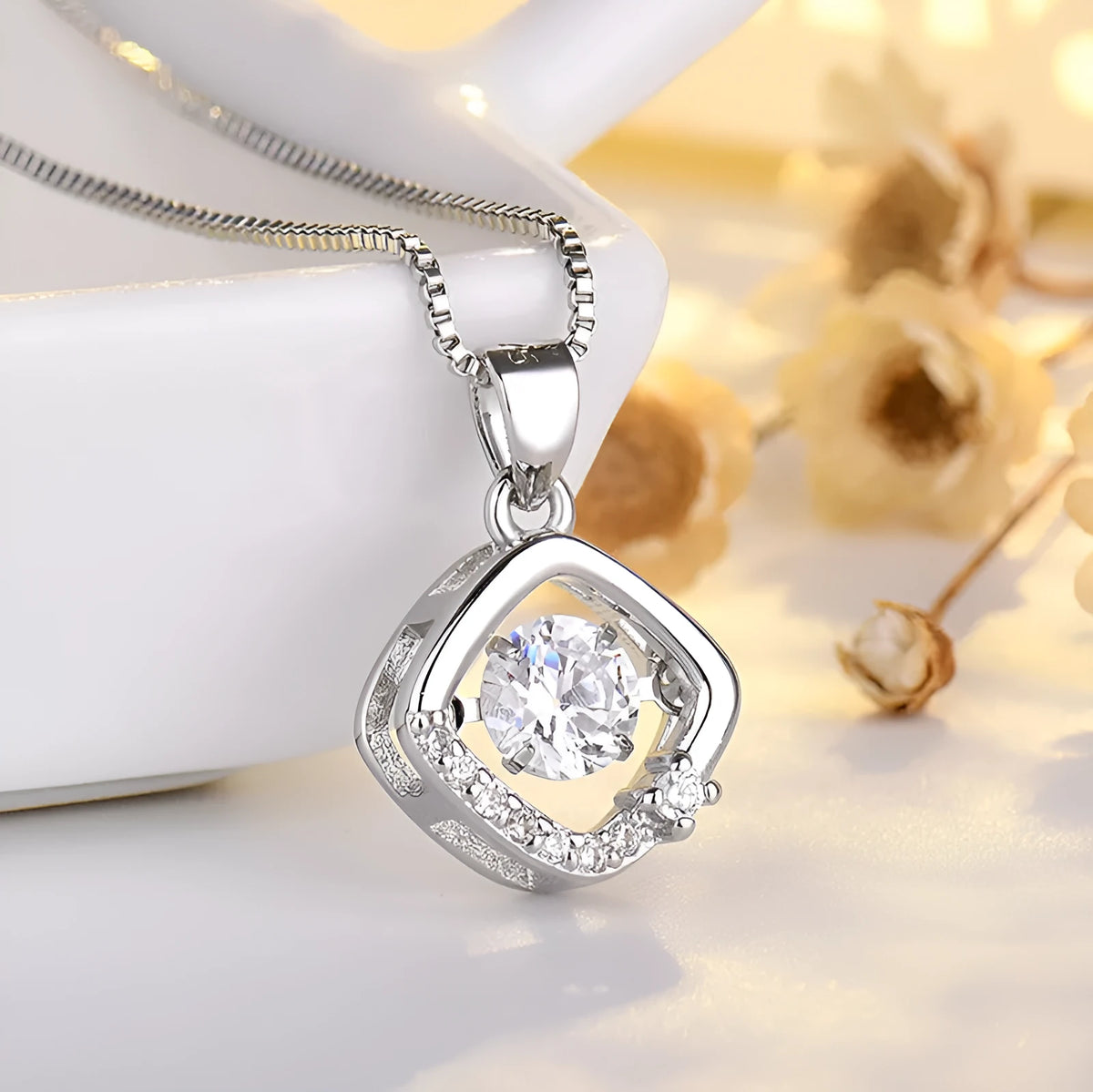 Sterling silver heart-shaped pendant necklace with crown and bow detail in rose gold or silver finish