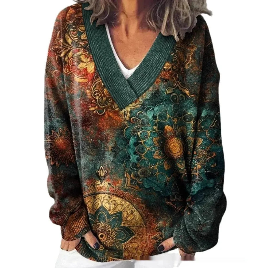 Women's grey V-neck sweatshirt with a white 3D floral pattern print and long sleeves.
