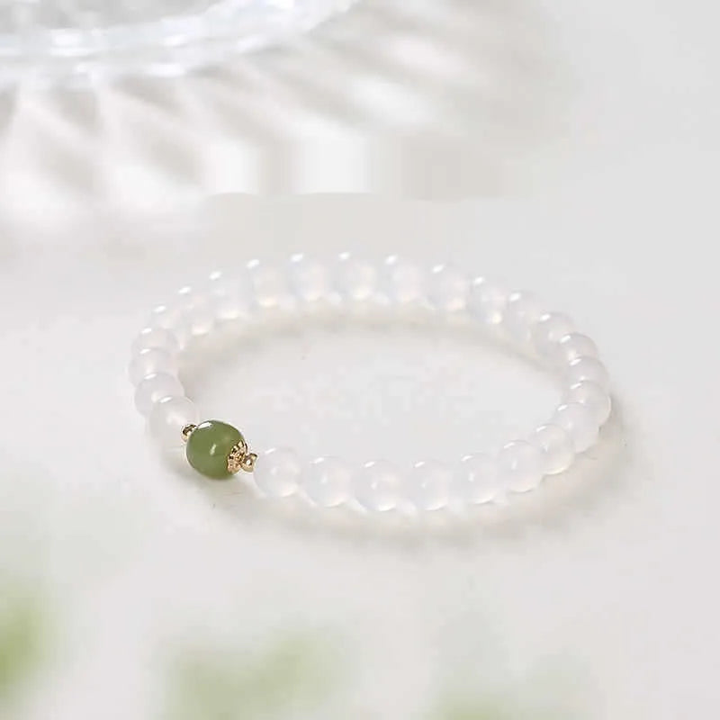 Handmade natural white agate and cinnabar crystal bracelet for men and women.