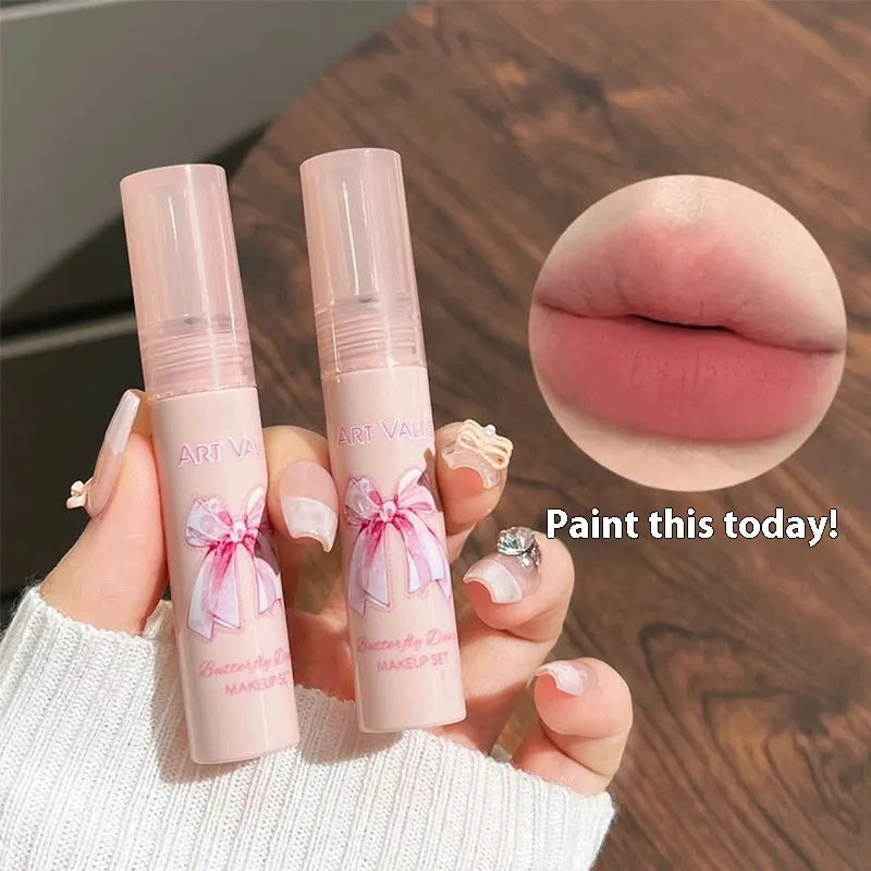 Butterfly Box pink makeup set with four matte lip muds, powder blusher and matching necklace