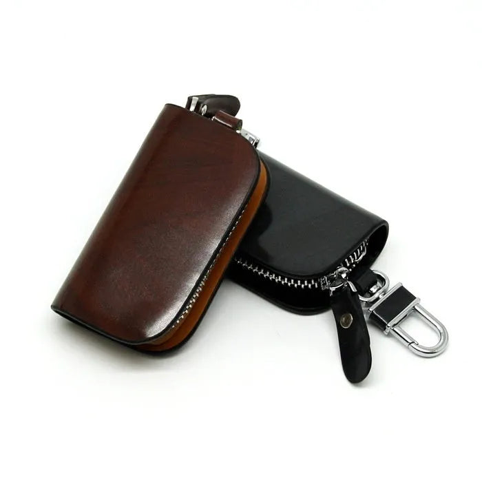 Black and brown genuine leather car key case with zipper closure showing inner dimensions