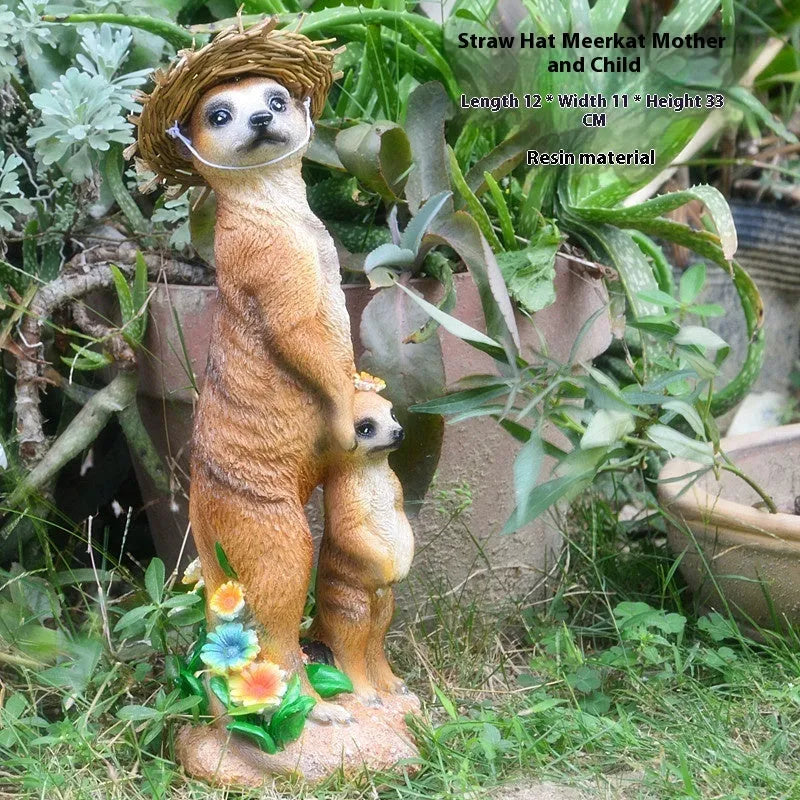 Three straw hat mongoose resin ornaments: mother and son, with rake, and with shovel figurines.