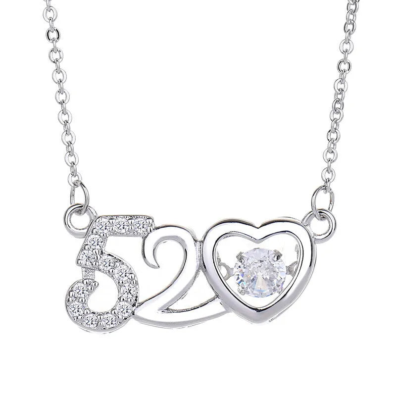 Sterling silver heart-shaped pendant necklace with crown and bow detail in rose gold or silver finish