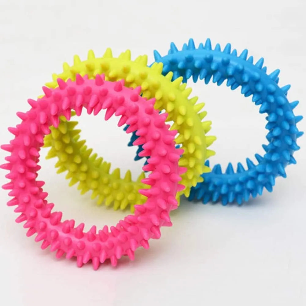 TPR spiky circle ring dog chew toy in blue with textured dental cleaning nubs
