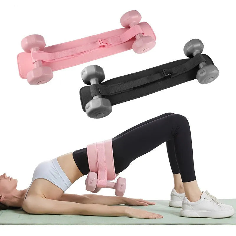 Black hip bridge training belt worn during dumbbell exercise
