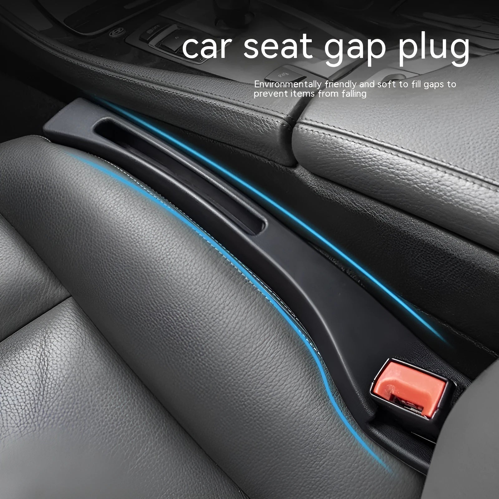 Black plastic car seat gap storage organiser box with a handle, shown inserted between vehicle seats.