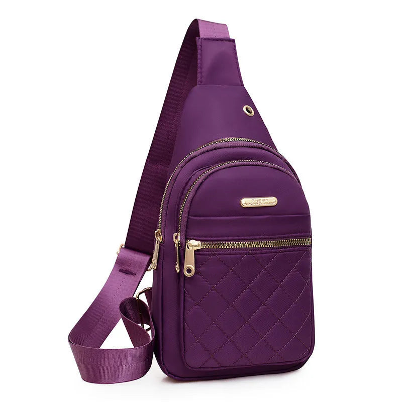 Girls' crossbody sports chest bag in Oxford cloth with plaid design, shown in a dark blue colour.
