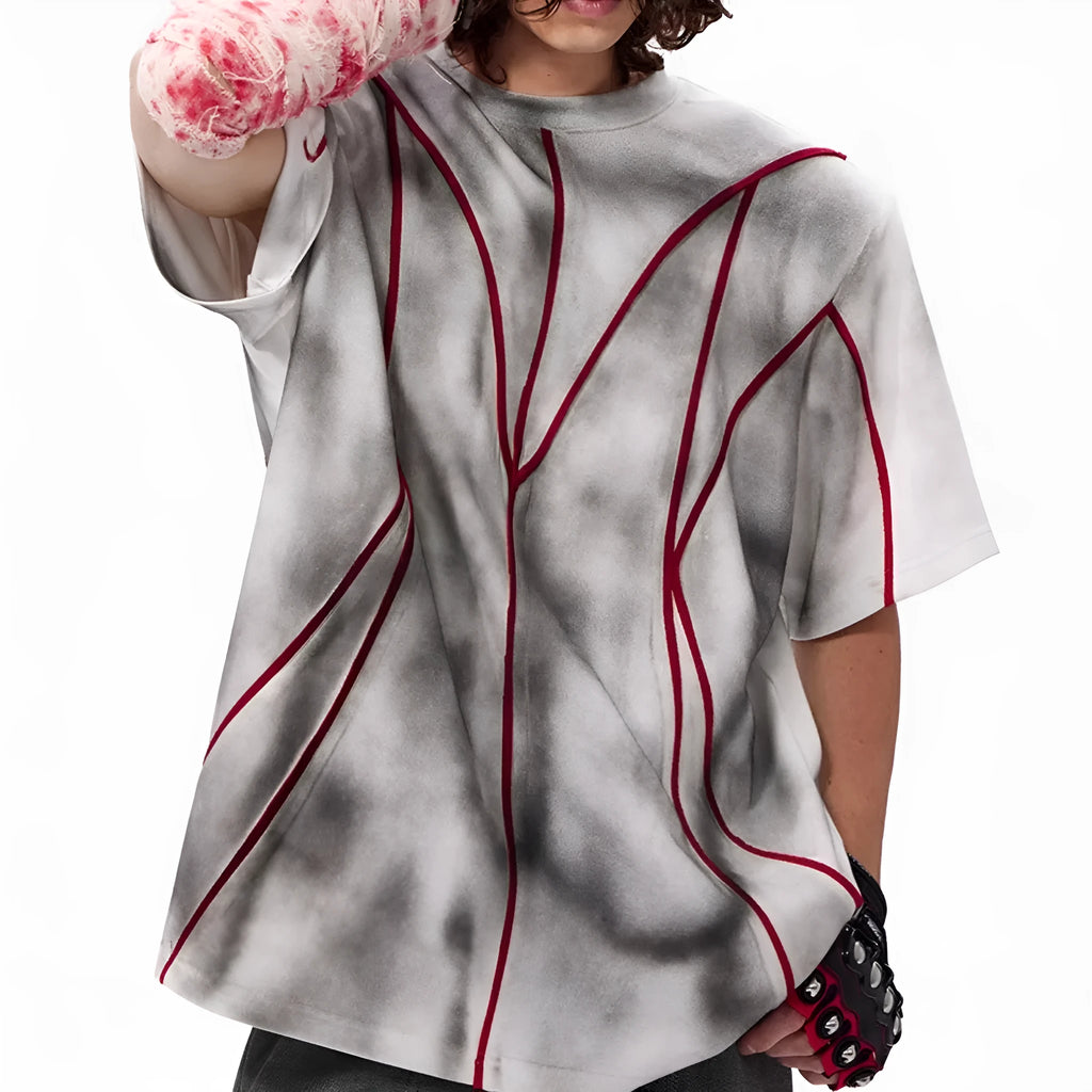 Women's grey padded shoulder t-shirt with 3D line patchwork design on front, short sleeves, round neck.