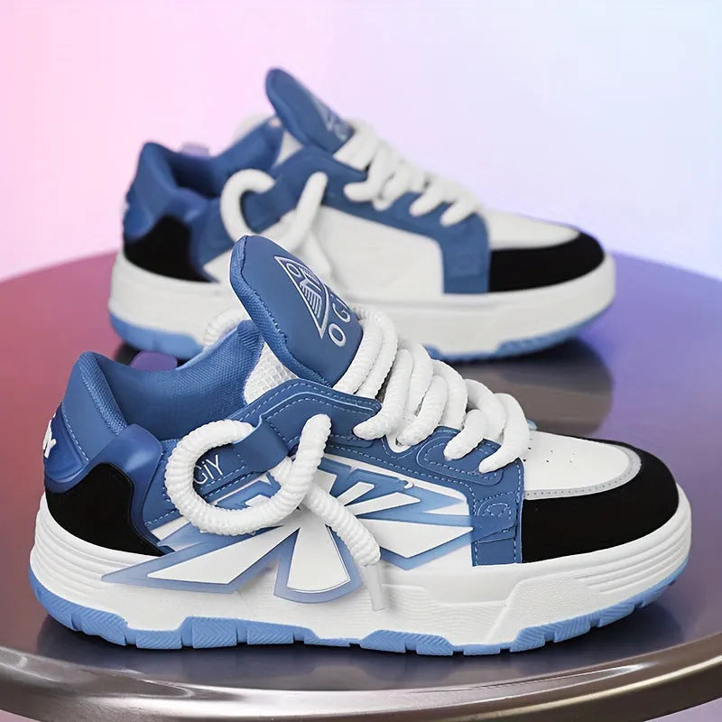 Men's white chunky sneakers with cartoon pattern, thick rubber sole, and lace-up front.