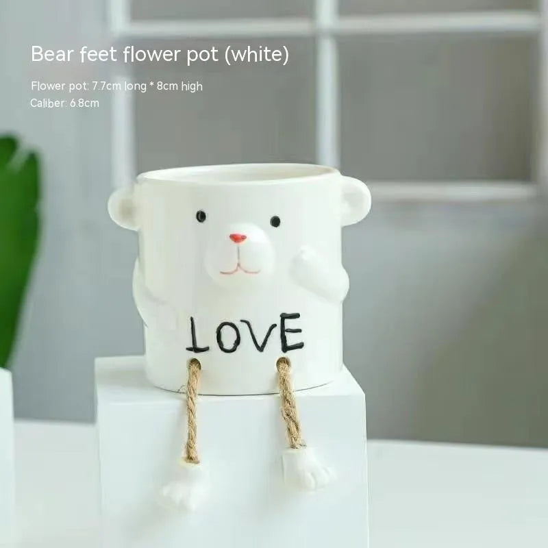 Ceramic hanging foot flowerpot in cartoon style for succulent plants on desktop
