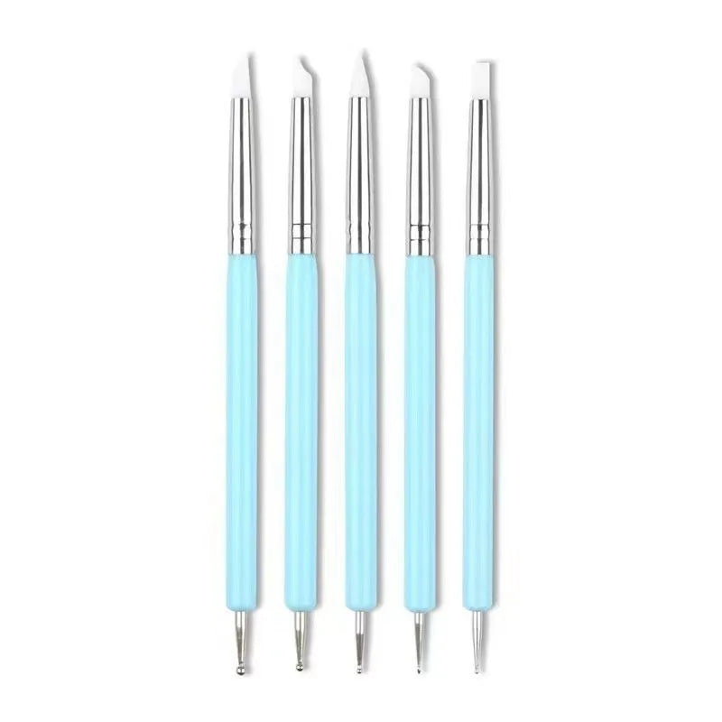 Five blue silicone double point drill pens in a manicure and painting pen set for nail art and craft use