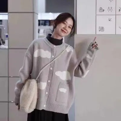 Blue cloud pattern women's loose cardigan sweater with long sleeves.