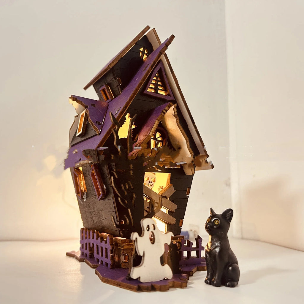 Wooden glowing haunted house Halloween table decoration with candlestick holder function.