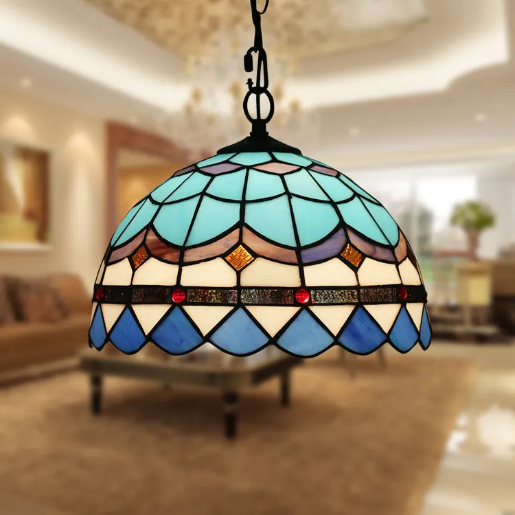 European retro baroque style chandelier with coloured glaze finish and abstract shapes.
