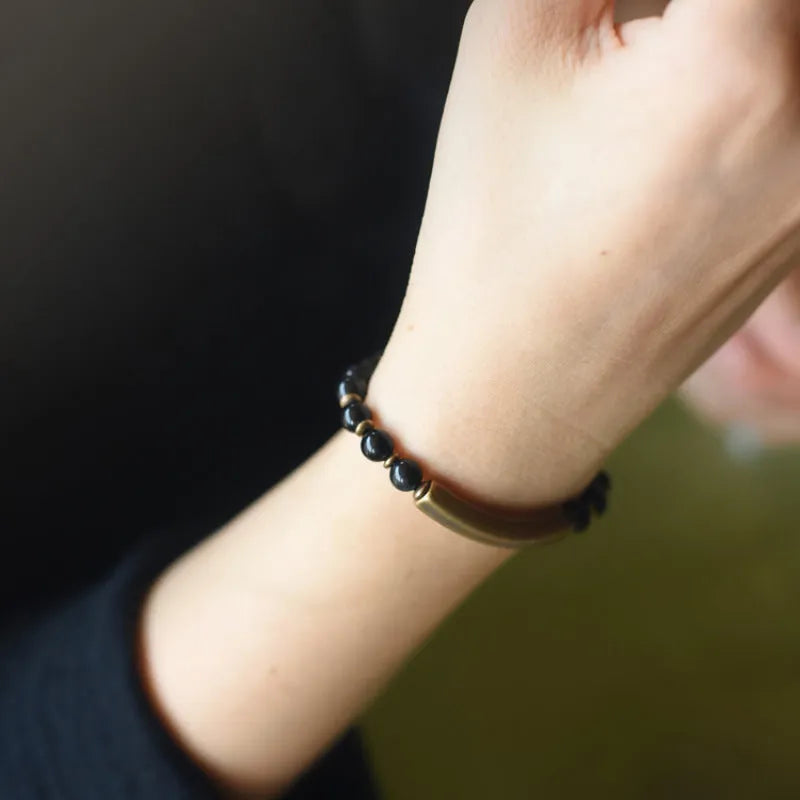 Layered ethnic bracelet for men and women in natural stone and brass, showing colour options.