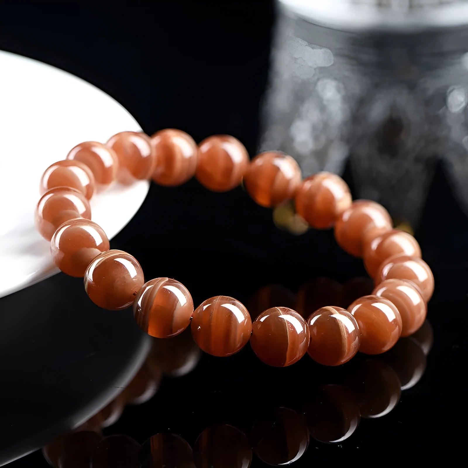 Natural Old Mine Rhodochrosite round bead bracelet with Ruyi element, choice of 6mm or 8mm beads.