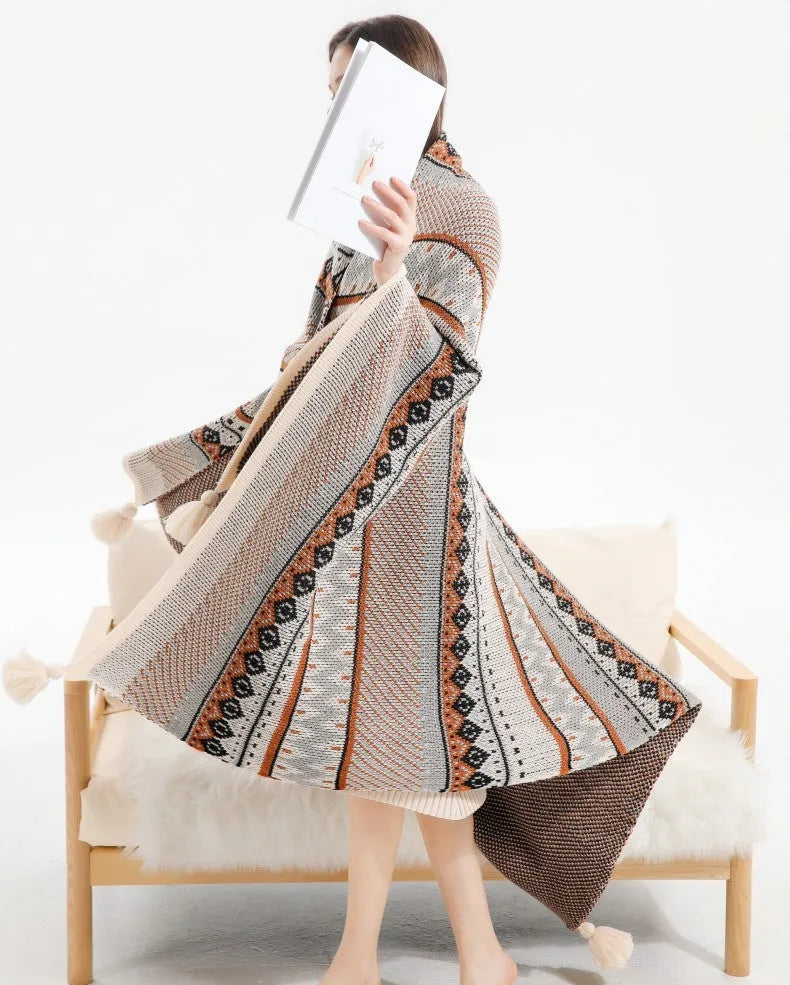 Bohemian-style acrylic sofa cover blanket with tassel trim in a geometric pattern colour option