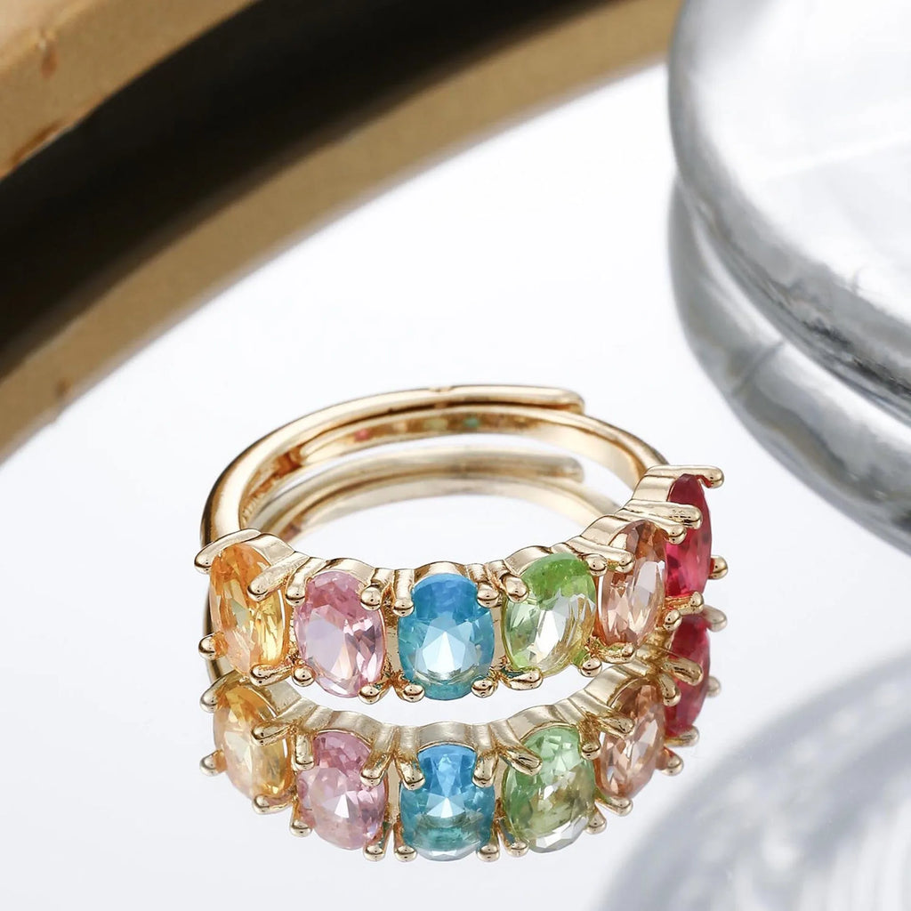 Women's adjustable gold-coloured ring with zircon stones in retro design