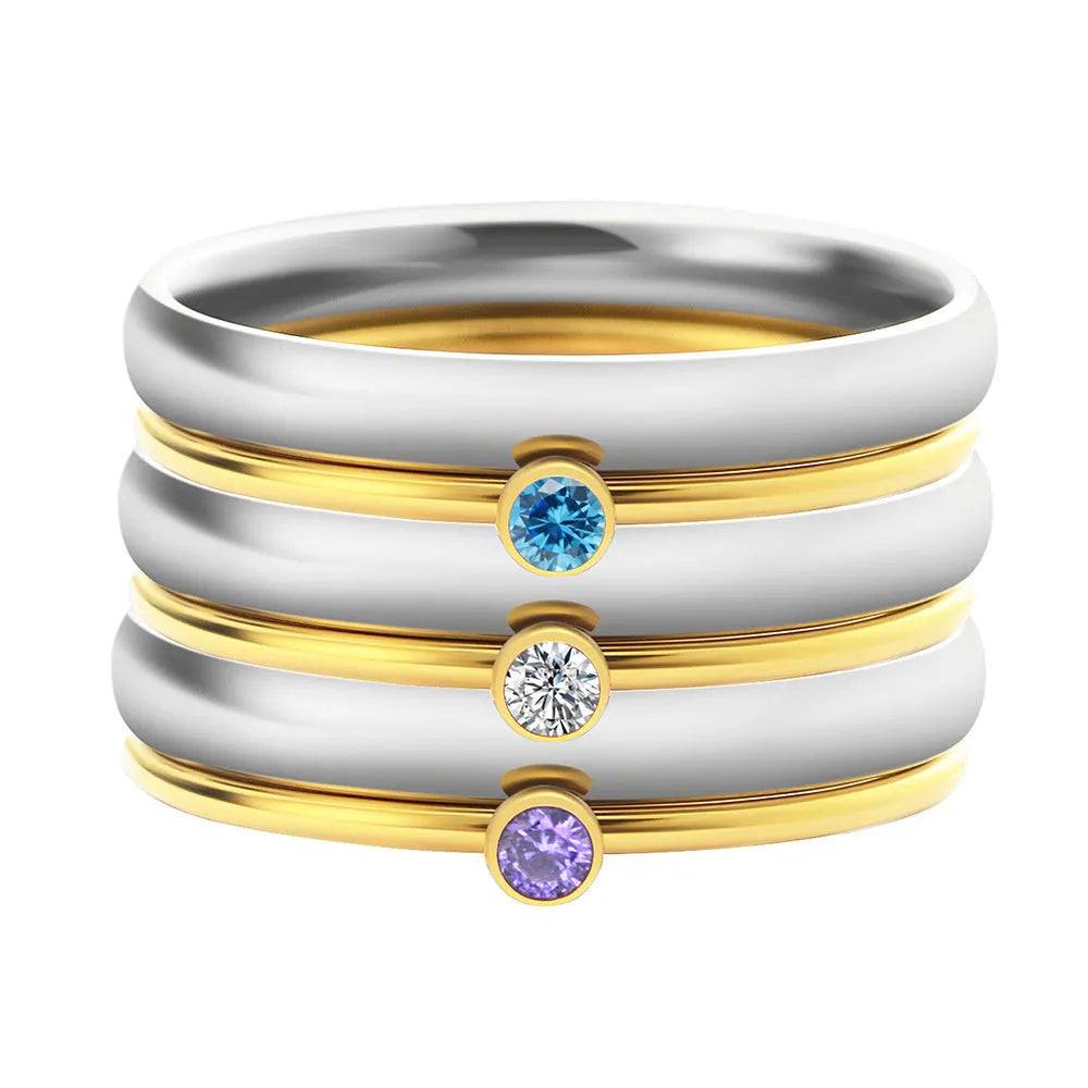 Geometric stacking ring for women with December birthstone colour and gold electroplated finish.
