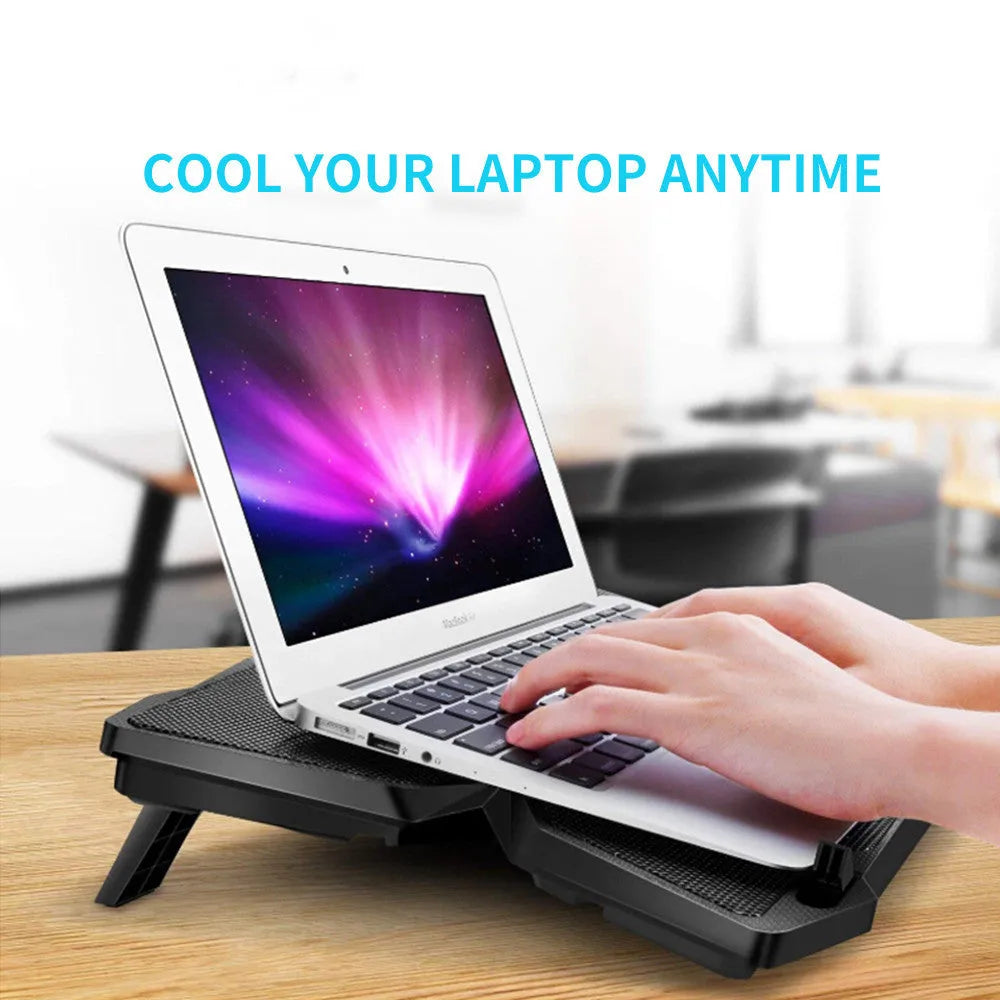 Blue laptop cooling base with four LED fans and two USB ports visible on the side
