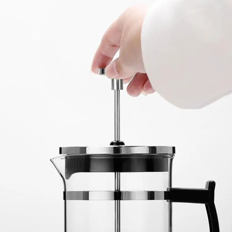 Small glass pour-over coffee maker with stainless steel filter, 350ml capacity.