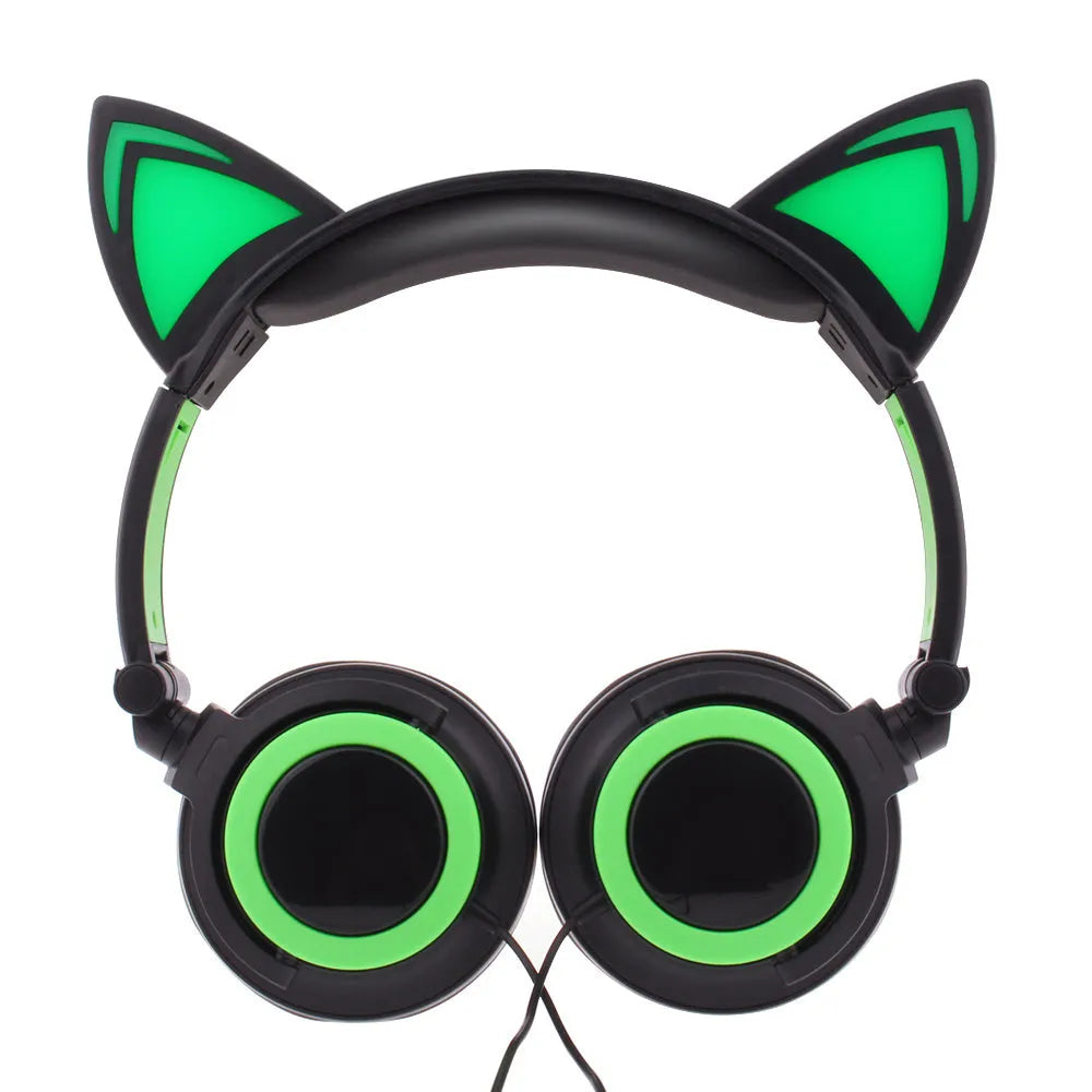 Black cat ear headphones with glowing pink LED lights on the ears and ear cushions.