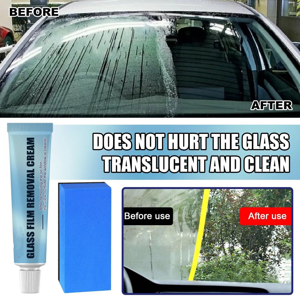 Blue sponge and bottle of car glass oil film remover cleaner on a car windscreen.