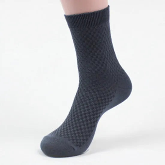 Men's bamboo fibre socks showing small square pattern in black colour with size scale