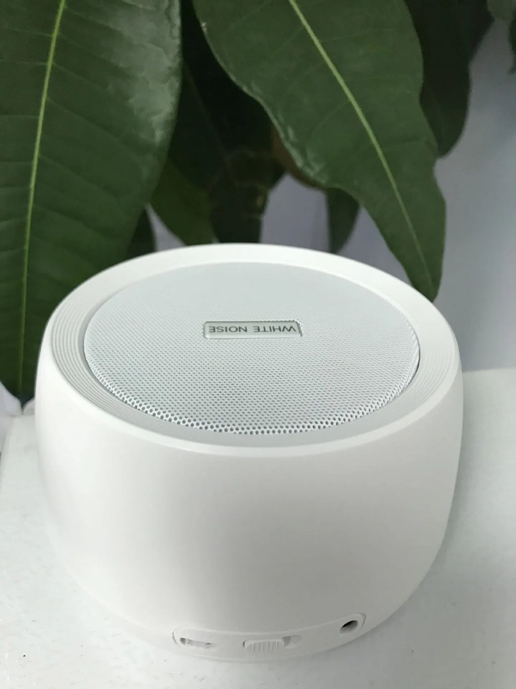 White noise sleep aid machine with compact USB design in white finish
