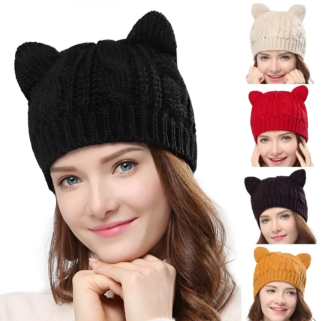 Hand-knitted red wool beanie with 3D cat ears on adult model in winter setting