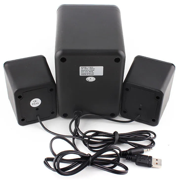 Green 2.1 USB computer speaker with glowing colourful lights showing USB and audio jack ports