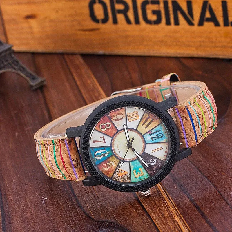 Women's leather strap quartz watch with 37mm round dial and stainless steel buckle