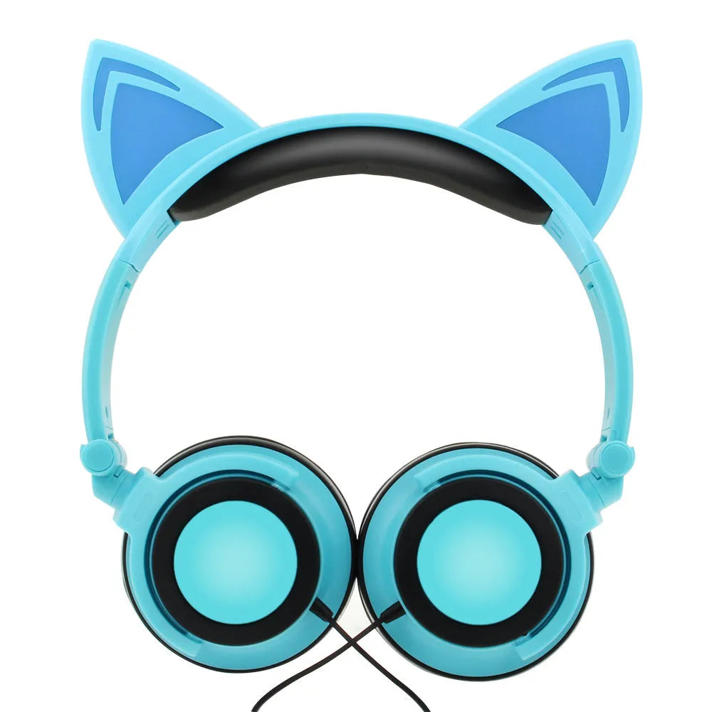 Black cat ear headphones with glowing pink LED lights on the ears and ear cushions.