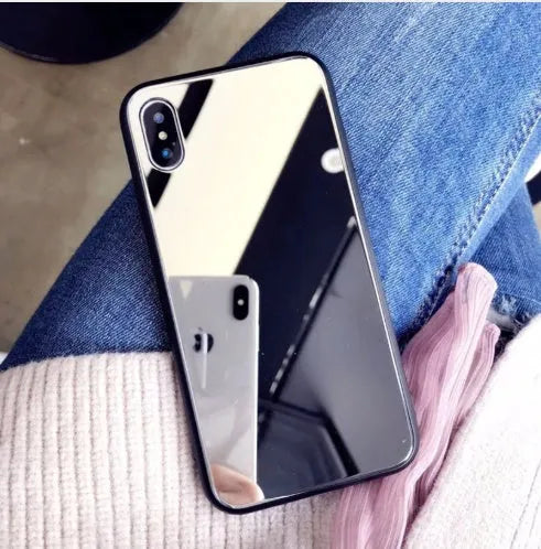 Black mirror back cover case for iPhone showing reflective surface.