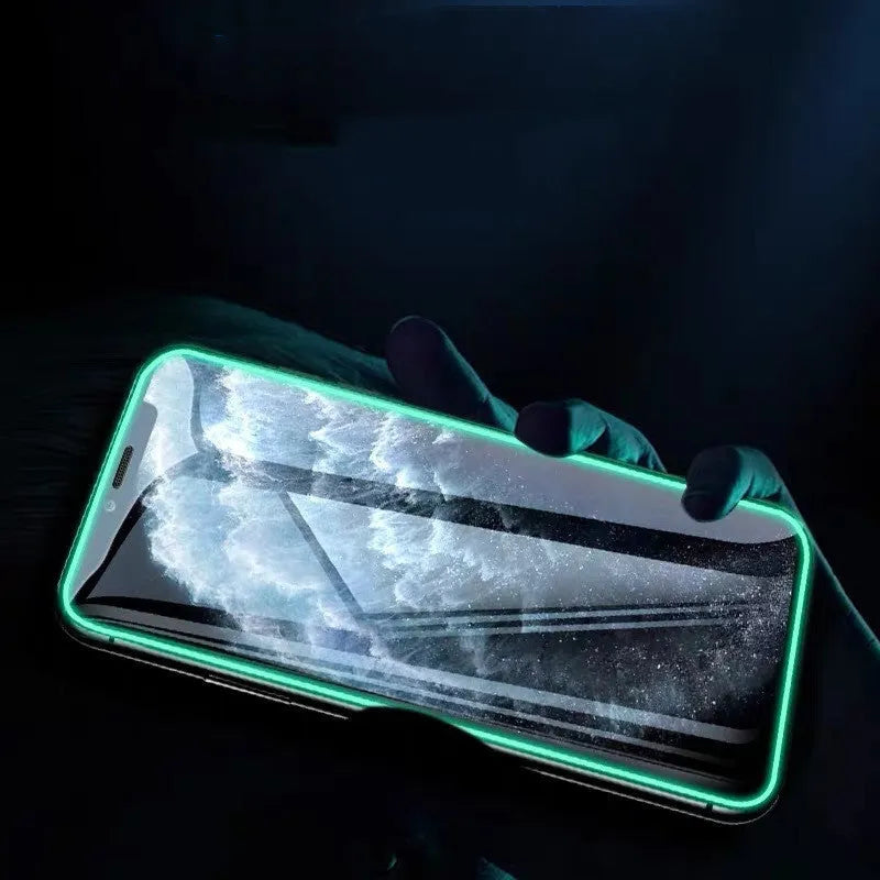 Luminous full cover tempered glass screen protector for iPhone glowing in dark with anti-scratch features.