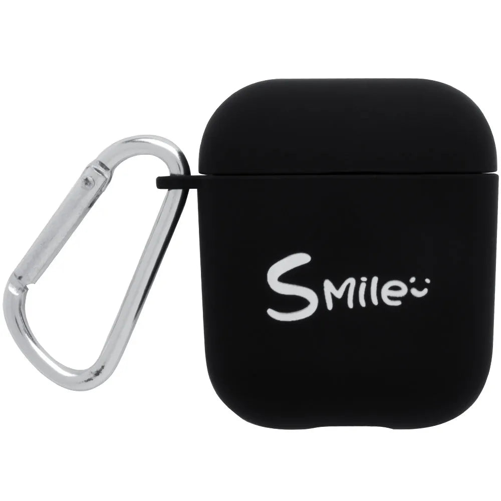 Black AirPods hard case with a smiley face design next to a pink case with a flower pattern.