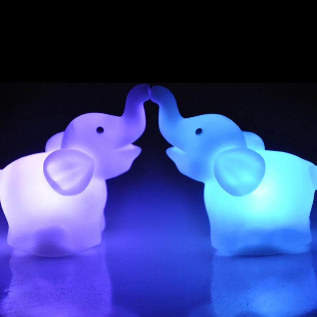 Elephant night light, vinyl, 8x8.8x4.5cm, with 7 colour changing slow flashing battery-powered light