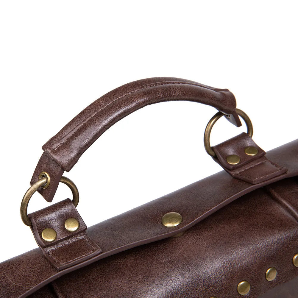 Bronze steampunk pillow shoulder bag with metal hardware on a textured PU leather surface.