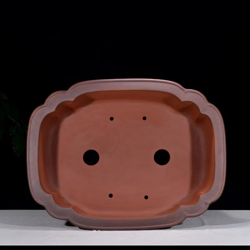 Chinese-style antique finish purple clay oval flowerpot measuring 71cm long by 54cm wide