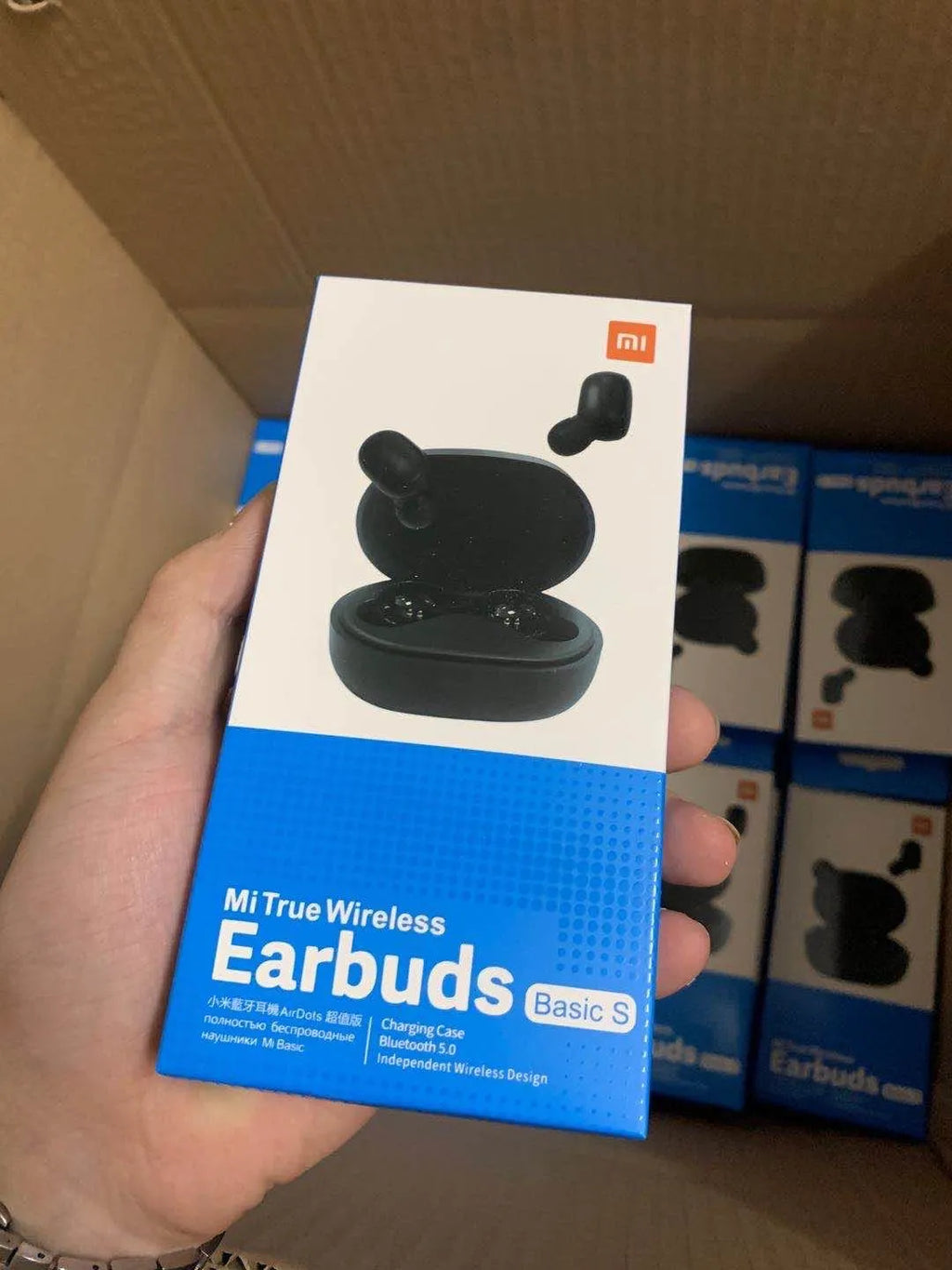 Redmi AirDots 2 Black true wireless Bluetooth earbuds and charging case on a white background.