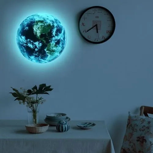 Glow in the dark 3D planet Earth wall sticker in multiple sizes on a bedroom wall.