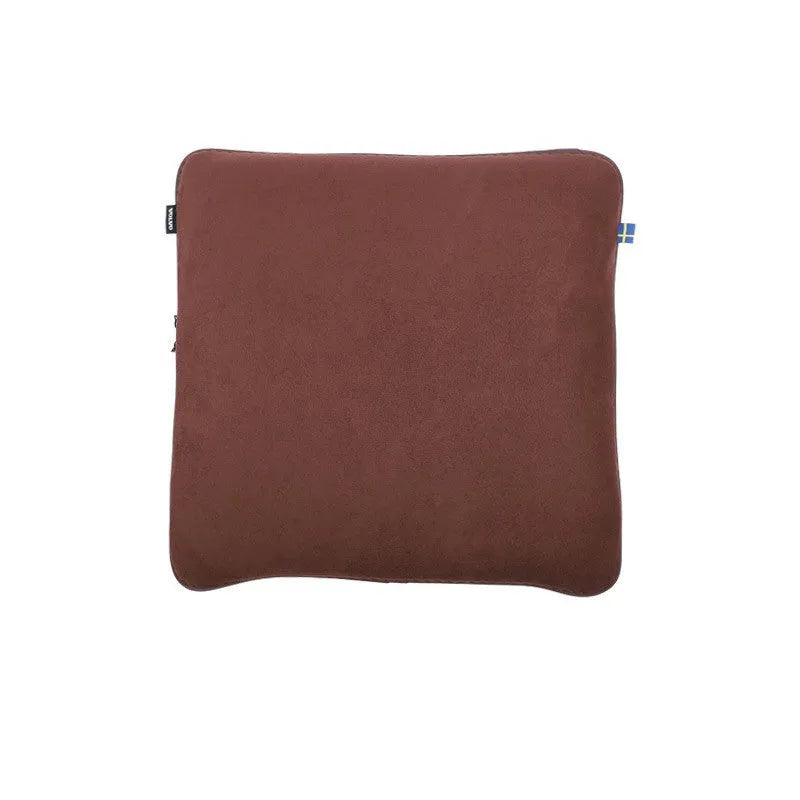 Minimalist brown car headrest with integrated neck pillow and lumbar support cushion.