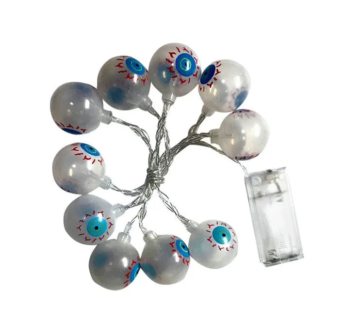 Halloween decoration LED string lights with 10 LED heads including pumpkin, bat, and ghost pendants on a dark background