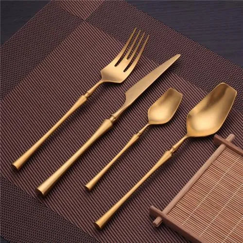 Four-piece stainless steel cutlery set with main knife, main fork, main spoon and teaspoon for gift-giving occasions